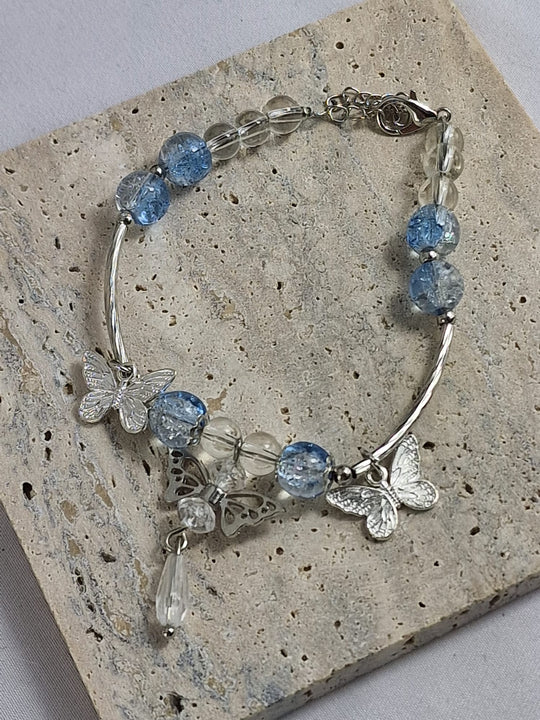 Betoverende Armband met Blauwe Kristallen en Vlinders