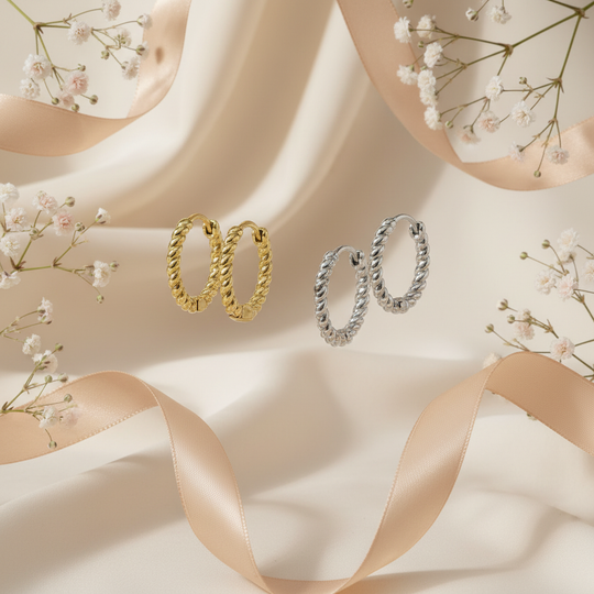 Gedraaide creolen met florale elementen