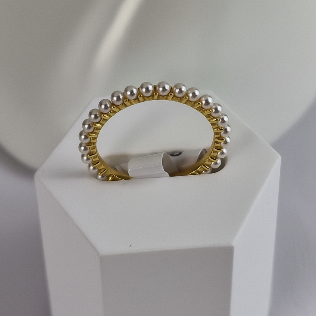 Gold pearl ring close-up
