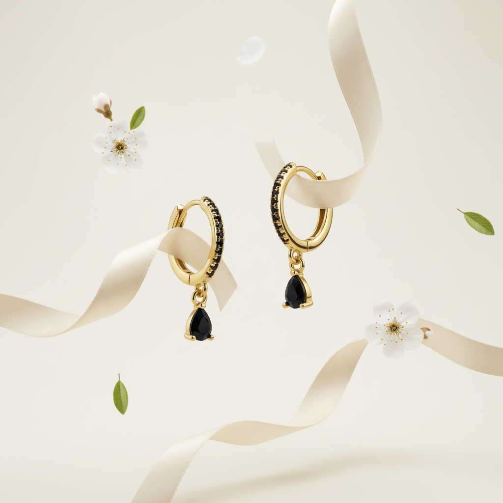 Goud zwarte druppel met florale elementen
