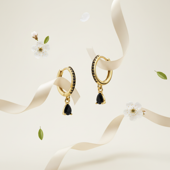 Goud zwarte druppel met florale elementen