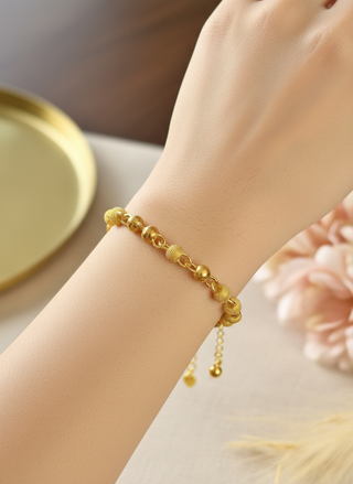 Gouden bolletjes armband