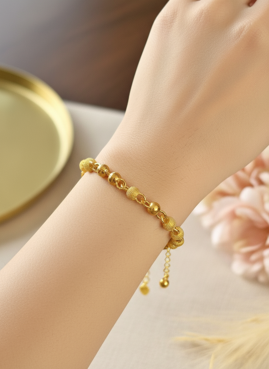 Gouden bolletjes armband