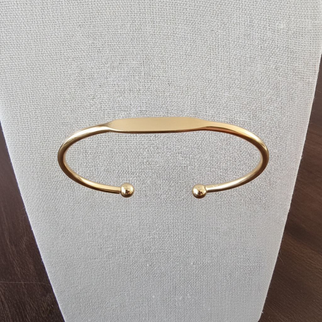 Zwevende open manchet armband bolletjes goud