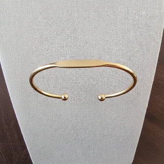 Zwevende open manchet armband bolletjes goud