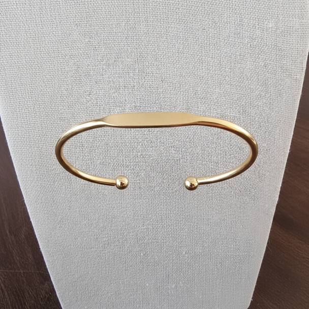 Zwevende open manchet armband bolletjes goud