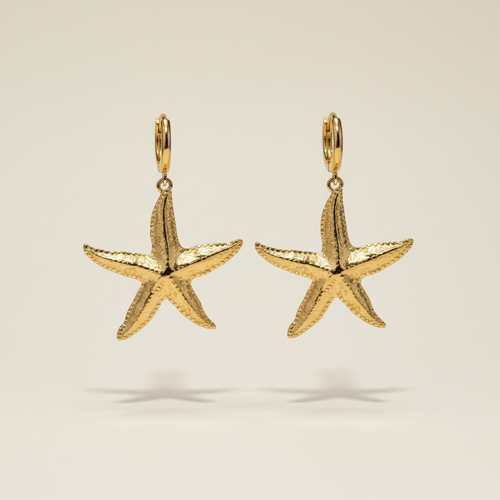 Gouden zeester creool oorbellen zwevend - paar