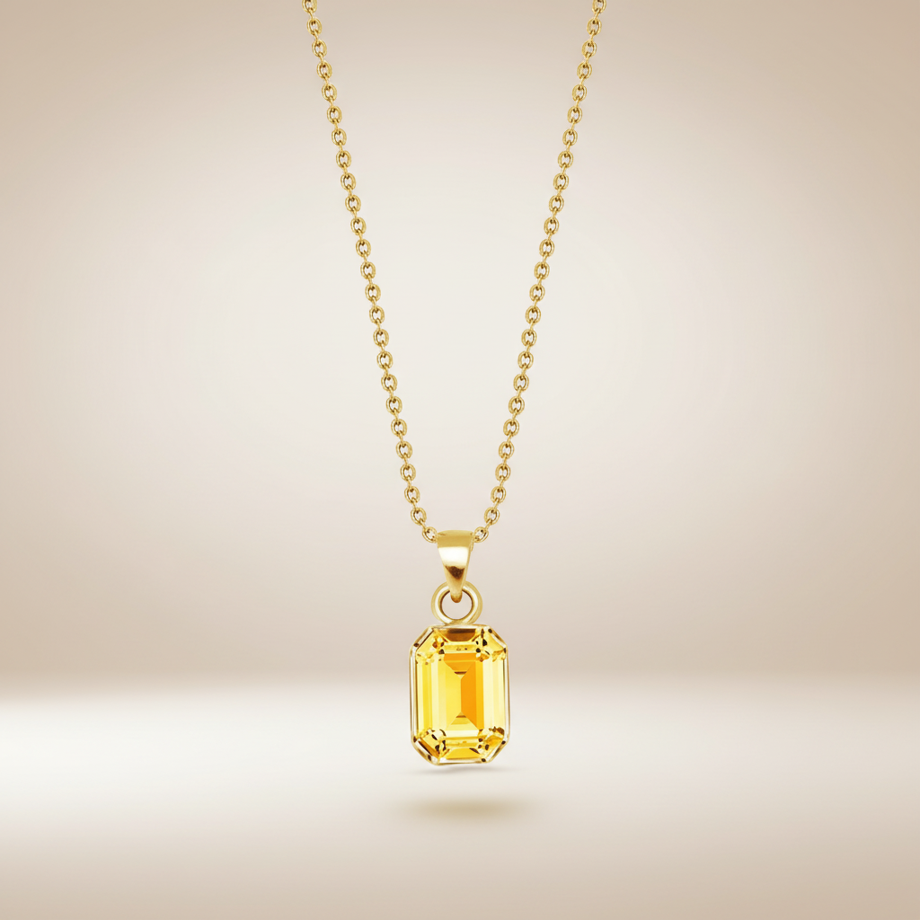 Gouden ketting met gele kristal hanger zwevend