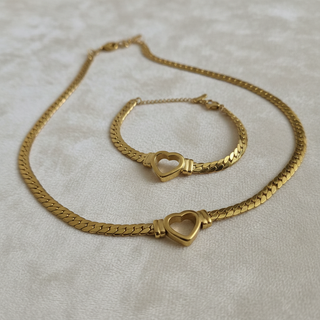 Close-up gouden hartjes set - ketting en armband met Cuban chain en hart-sluitingen - 18K goud verguld