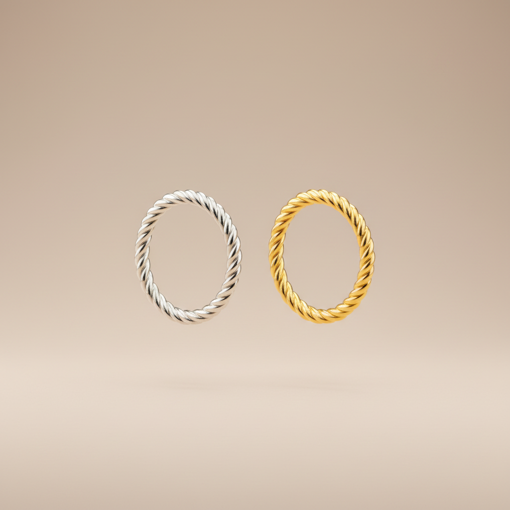 Zwevende twisted rope ringen zilver en goud