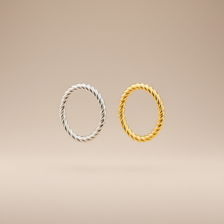 Zwevende twisted rope ringen zilver en goud