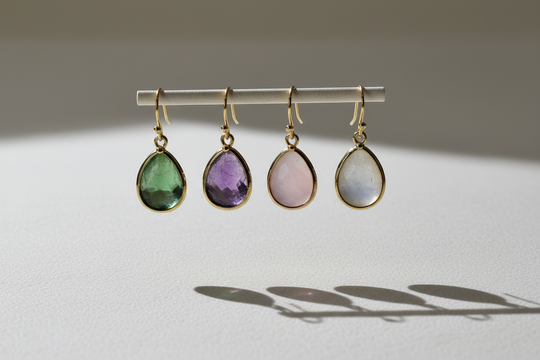 Druppel oorbellen zwevend - 4 kleuren op een rij