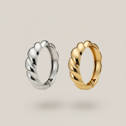 Zwevende chunky twisted armbanden zilver en goud