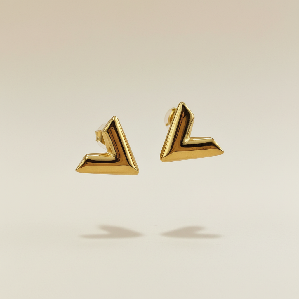 Gouden V-vormige oorknopjes zwevend