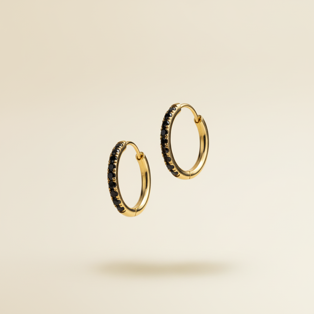 Gouden creool oorbellen zwarte zirkonia zwevend