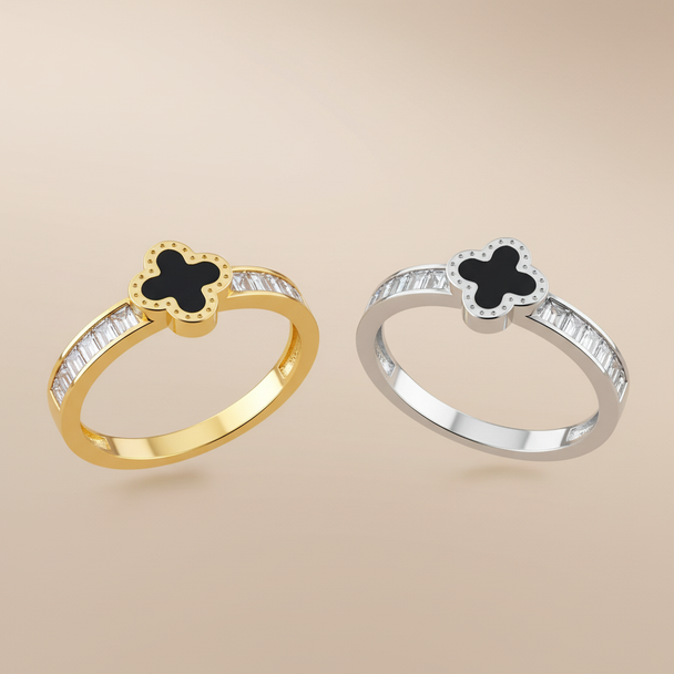 Zwevende klavervier ringen zwarte emaille goud en zilver