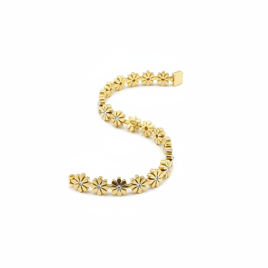 Gouden bloemen armband studio foto witte achtergrond