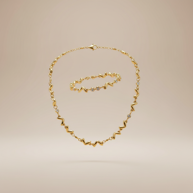 Zwevende zigzag wave ketting en armband set goud