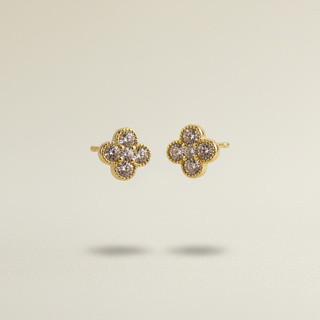 Gouden klaver oorknopjes zwevend