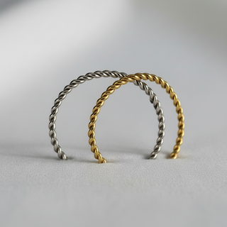 Close-up detail twisted kabel patroon zilver en goud