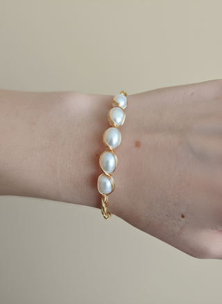 Parelarmband met verguld design studio foto