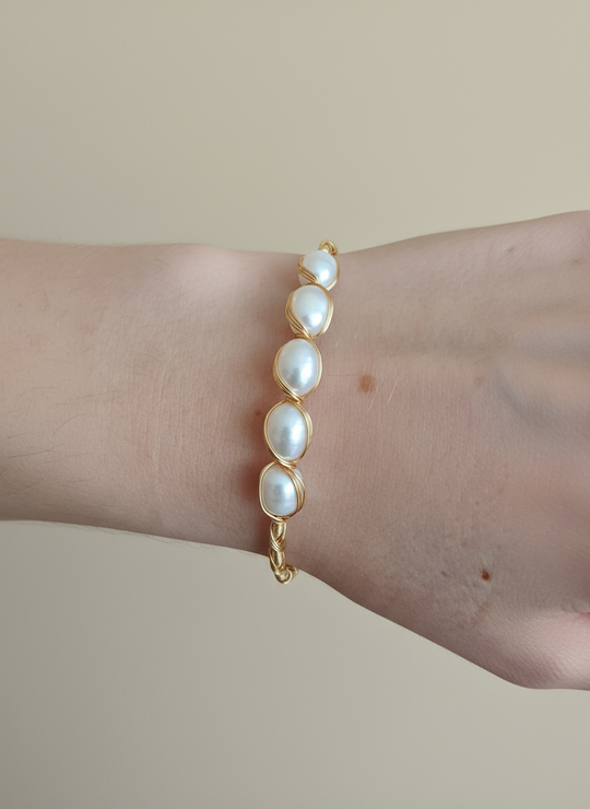 Parelarmband met verguld design studio foto