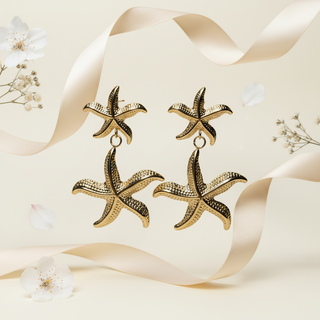 Zeester oorbellen met florale elementen