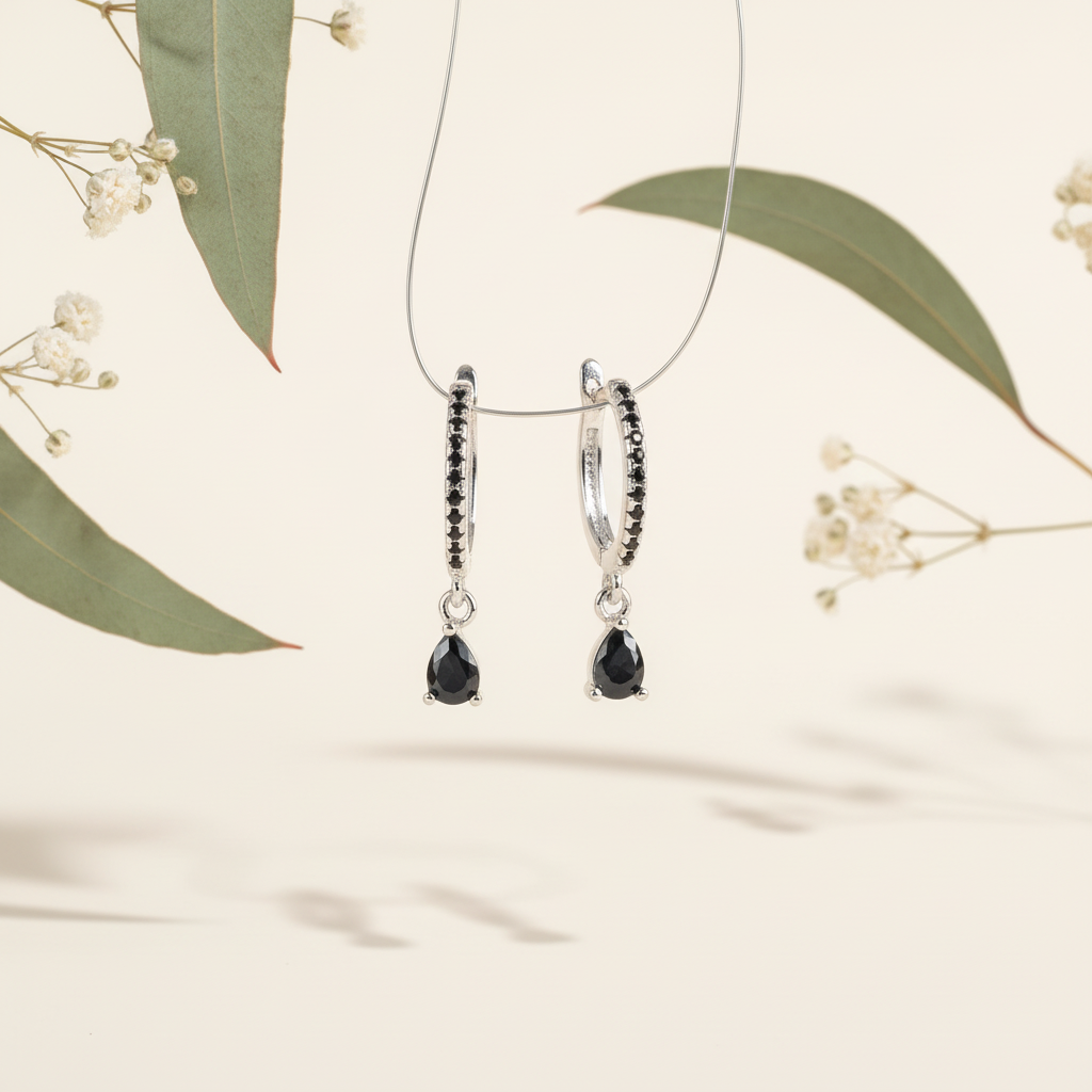 Zilver zwarte druppel met botanische elementen