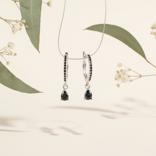 Zilver zwarte druppel met botanische elementen