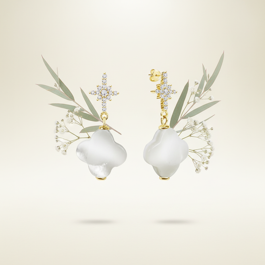 Zoetwaterparel oorbellen met botanische elementen